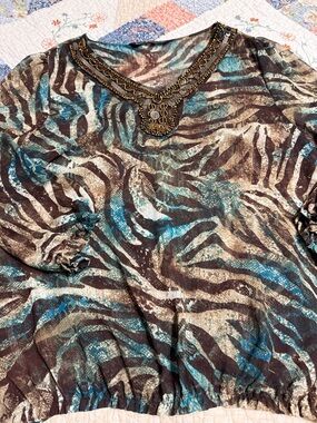 Zac & Rachel Beaded V-Neck Zebra top gathered at the waist in Teal and Brown